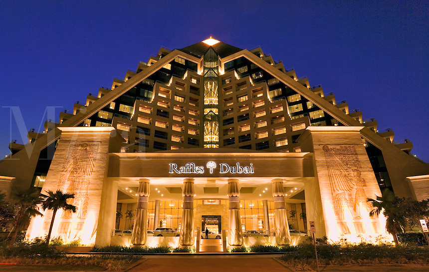 Dubai.  Raffles Hotel built on an Egyptian theme and adjacent to the Wafi Mall, a luxurious shopping centre/center.  Evening.